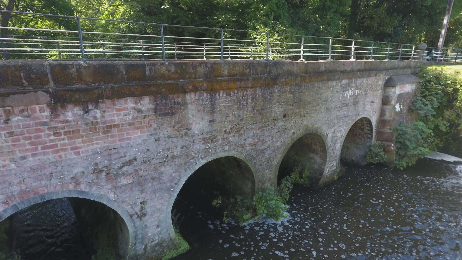 Close-up of 16th Century bridge brick arches and lime mortar joints